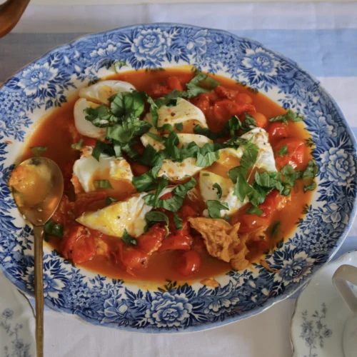 Poached eggs with Tomatoes and Hummus